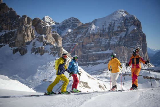 Skiers on a guided ski safari in the Dolomites, Italy