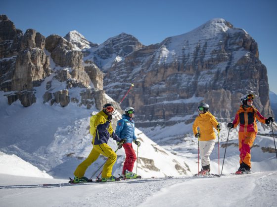 Skiers on a guided ski safari in the Dolomites, Italy