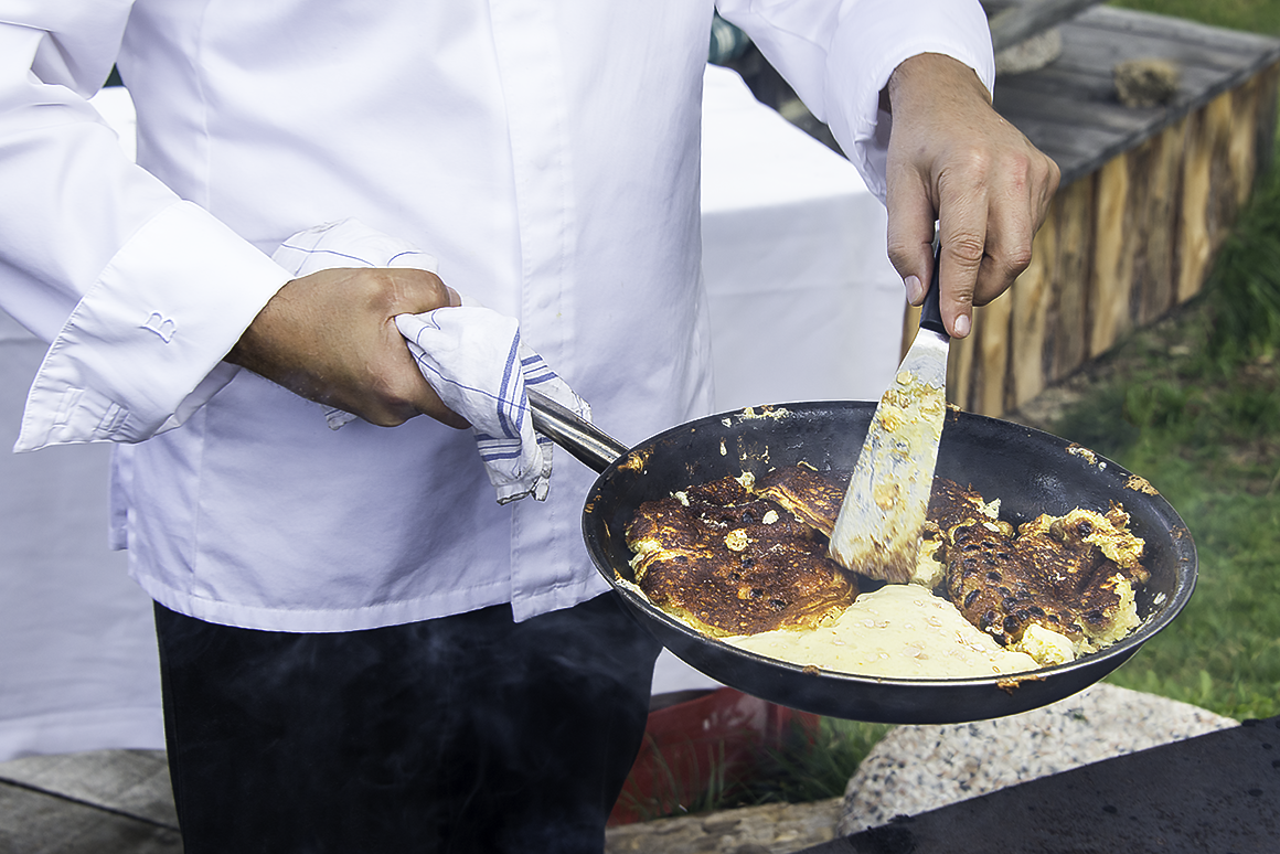 Cooking a Kaiserschmarrn Pancake in the Dolomite Mountains